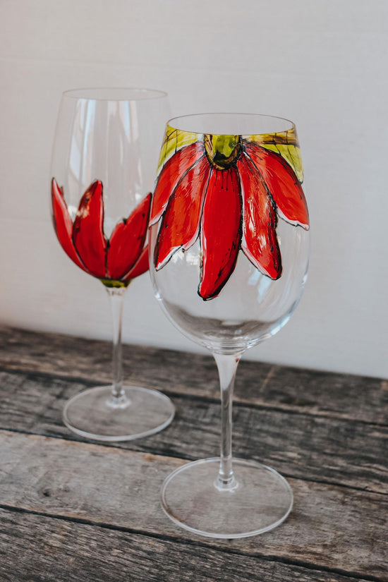 Duo of half red flower design wine glasses
