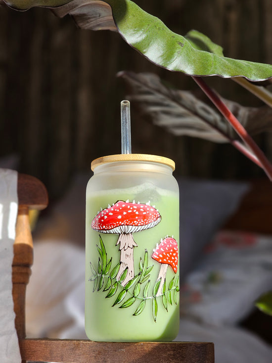 Frosted glass can with mushroom design lid and straw