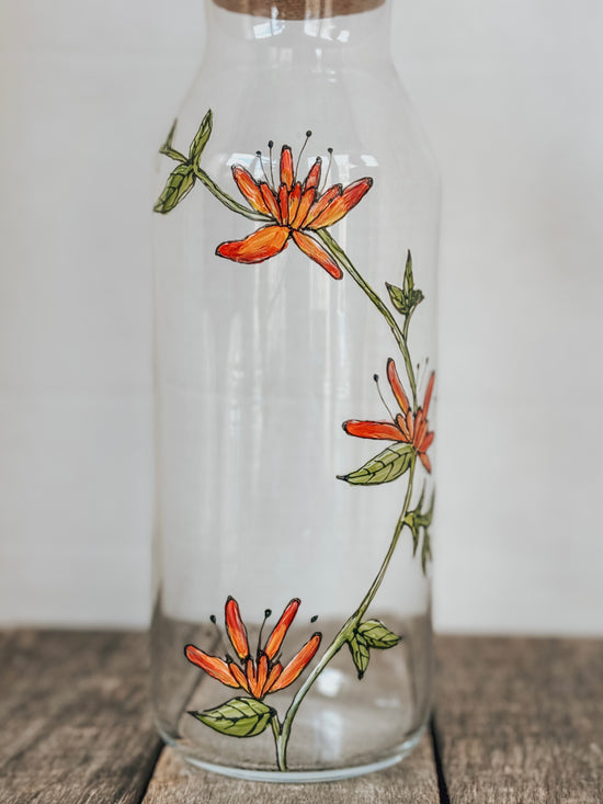 Carafe d'eau en verre design fleur abstraite