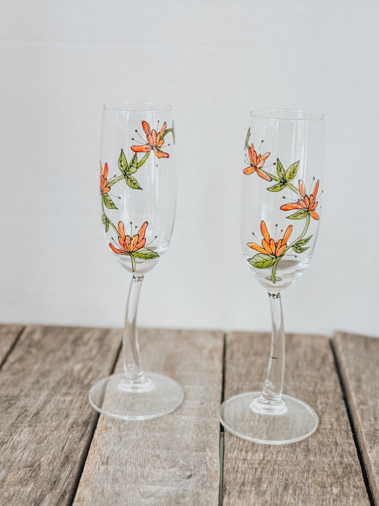 Duo of abstract flower champagne flutes