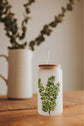 Frosted glass can with eucalyptus design lid and straw