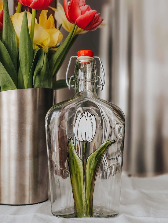 Recycled glass bottle with tulip design