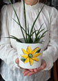Cache-pot blanc design fleur jaune Pero