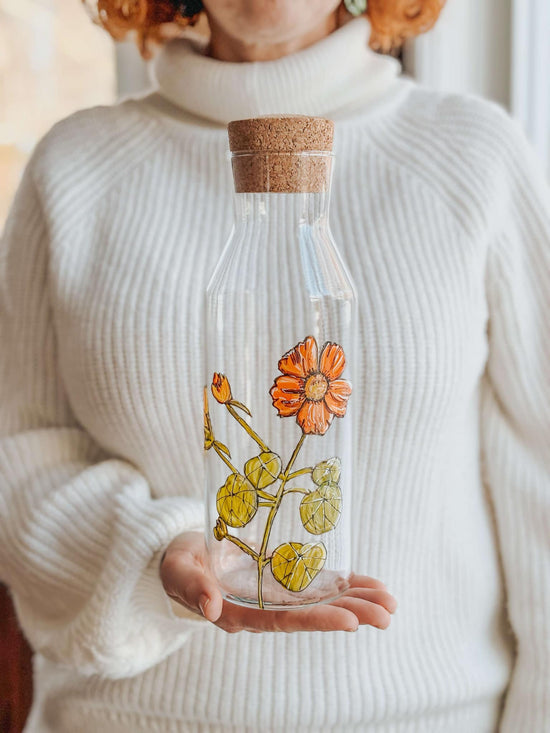 Carafe d'eau en verre design fleur de capucine