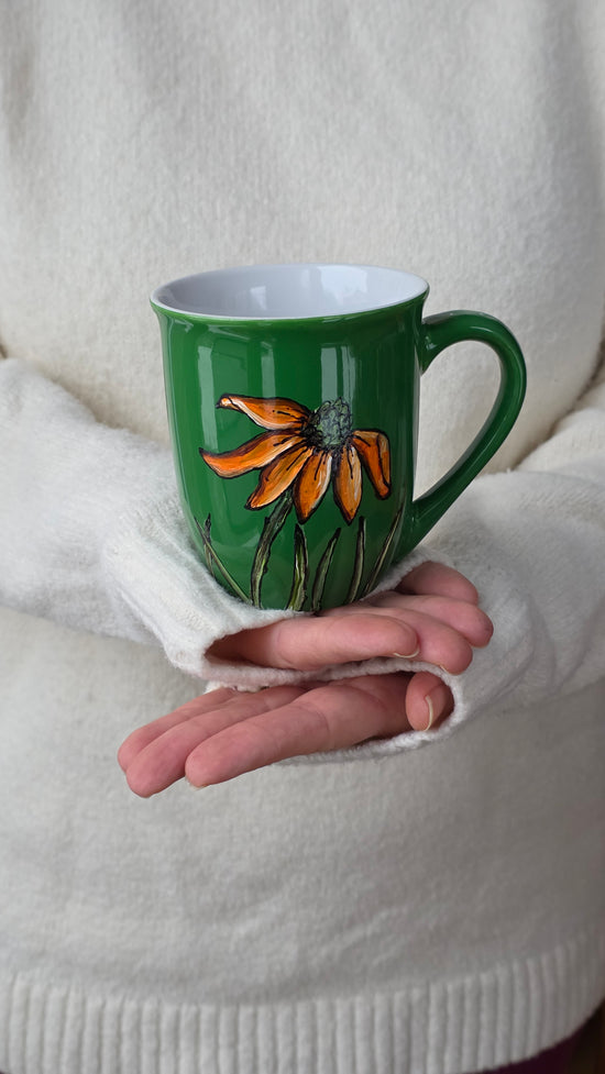 Tasse en grès vert design fleur orange