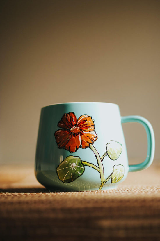 Tasse en porcelaine bleu design capucine