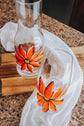 Water carafe and 1 duo of stemless glasses orange flower design