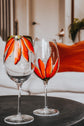 Duo of orange flower design wine glasses