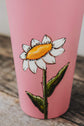 Reusable and insulating pink water bottle with white daisy design