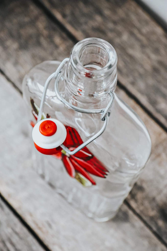 Bouteille verre recyclé | huile ou vinaigrette | fleur rouge