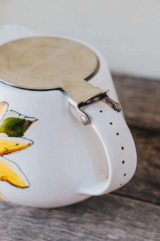 Théière avec infuseur design fleur jaune