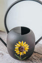 Black watering can sunflower design