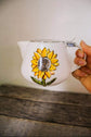 Teapot with sunflower design infuser