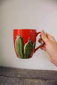 Tasse en grès rouge design cactus